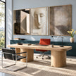 Abstract Face and Grid Triptych Painting shown in a workspace.