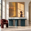 Amber Window Light and Figure Painting shown above a console.