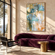 Aqua Fan Leaves with Gold Edges Wall Art shown above a burgundy sofa.