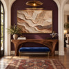 Beige Strata and Fine Contour Wall Art shown above a wood console and blue bench.