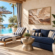 Beige Strata and Fine Contour Wall Art shown above a blue sofa.