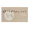 Birds Above a Pale Moon Painting. Pale moon on a beige background.