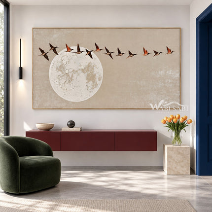Birds Above a Pale Moon Painting shown above a console.