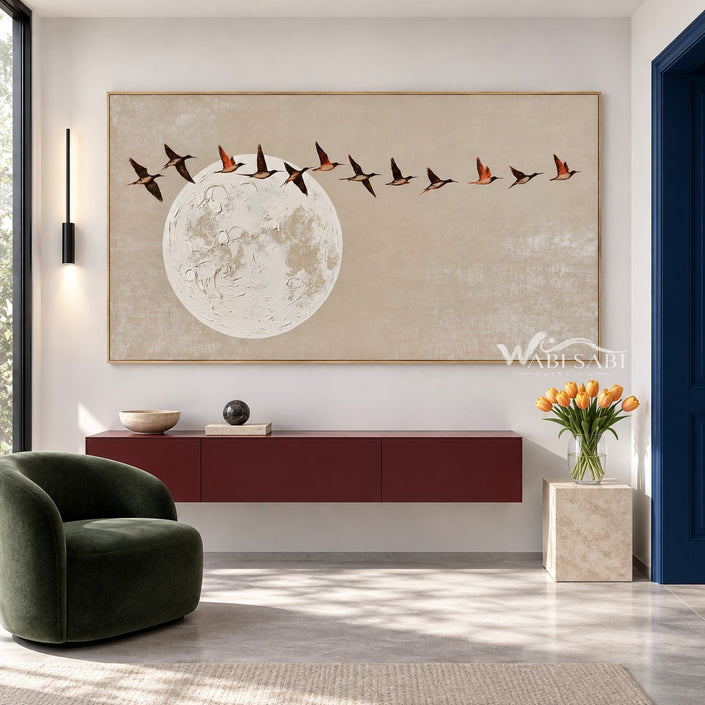 Birds Above a Pale Moon Painting shown above a console.