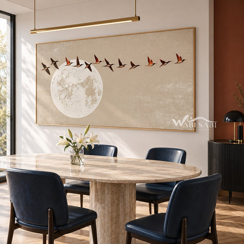 Birds Above a Pale Moon Painting shown in a dining area.