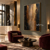 Black and Bronze Vertical Abstract Wall Art shown beside burgundy seating.