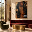 Black and Burnished Brown Abstract Wall Art shown above a burgundy sofa.