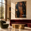 Black and Burnished Brown Abstract Wall Art shown above a burgundy sofa.