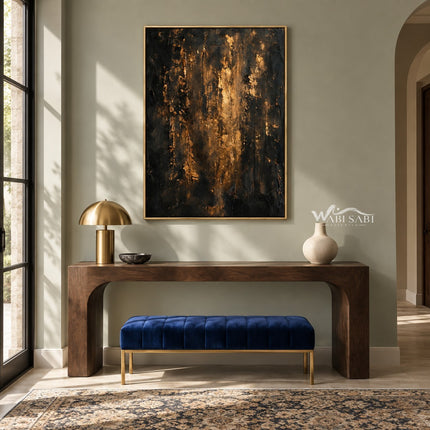 Black and Gold Color Streak Abstract Wall Art shown above a console and blue bench.
