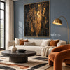 Black and Gold Color Streak Abstract Wall Art shown above a cream sofa.