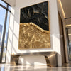 Black and Gold Faultline Painting shown above a console.