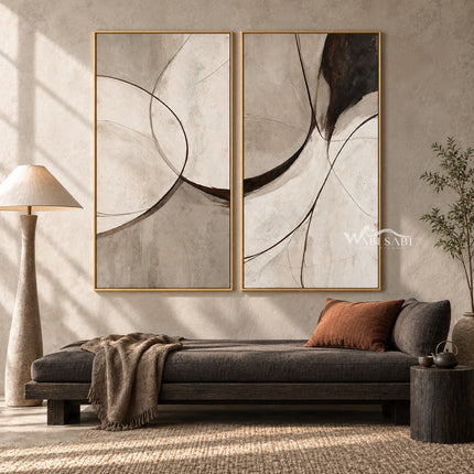 Black Arc and Gray Shape Diptych Wall Art shown above a dark sofa.