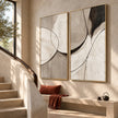 Black Arc and Gray Shape Diptych Wall Art shown beside a staircase.
