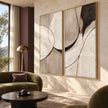 Black Arc and Gray Shape Diptych Wall Art shown above green seating.