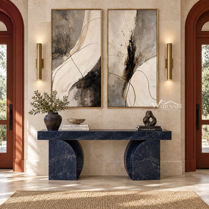 Black Brushwork and Ivory Sweep Diptych Wall Art shown above a blue console.