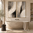Black Brushwork and Ivory Sweep Diptych Wall Art shown above a freestanding bathtub.