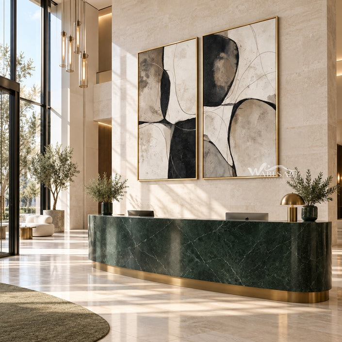 Black Curved Shapes on Cream Diptych Wall Art shown above a curved green counter.