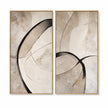 Large open loop on the left in black, gray, beige. Smaller curve on the right.