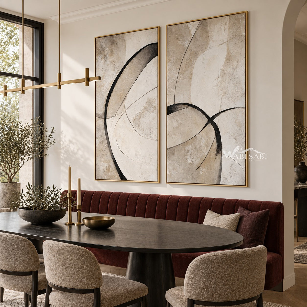 Black Loop and Fine Arc Diptych Wall Art shown behind a dining table.