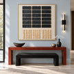 Black Rectangle Grid and Sand Squares Wall Art shown above a console and dark bench.