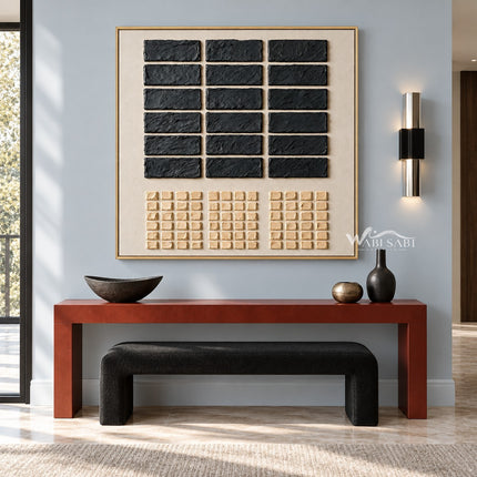 Black Rectangle Grid and Sand Squares Wall Art shown above a console and dark bench.