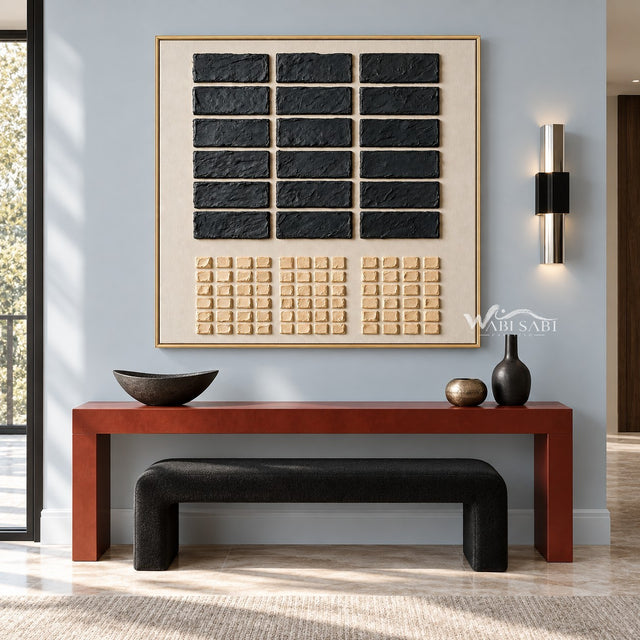 Black Rectangle Grid and Sand Squares Wall Art shown above a console and dark bench.