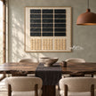 Black Rectangle Grid and Sand Squares Wall Art shown behind a dining table.