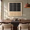 Black Rectangle Grid and Sand Squares Wall Art shown behind a dining table.