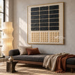 Black Rectangle Grid and Sand Squares Wall Art shown above a dark upholstered bench.