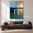Blue and Gold Tone Horizon Canvas Painting shown in a living room with a sofa.