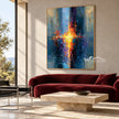 Blue and Orange Brushstroke Abstract Painting shown above a burgundy sofa.