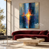 Blue and Orange Brushstroke Abstract Painting shown above a burgundy sofa.