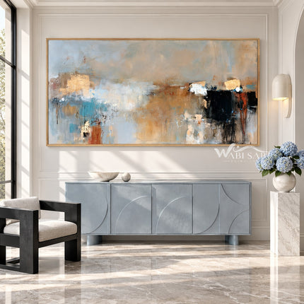Blue Gray and Black Block Abstract Painting shown above a console.