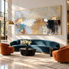 Blue Gray and Black Block Abstract Painting shown in a living room with a sofa.