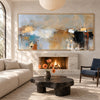 Blue Gray and Black Block Abstract Painting shown near a fireplace.