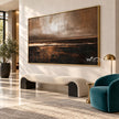 Bronze Horizon and Dark Water Wall Art shown above a curved pale bench.