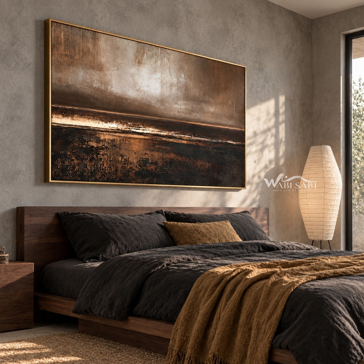 Bronze Horizon and Dark Water Wall Art shown above a bed with dark bedding.