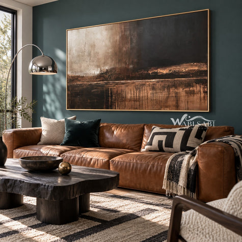 Brown Horizon Painting with Copper Reflections shown in a living room with a sofa.