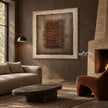 Brown Stacked Ridges on Taupe Wall Art shown above a sofa beside a fireplace.