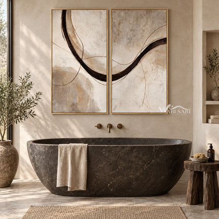 Brown Sweeping Arc Diptych Wall Art shown above a freestanding bathtub.