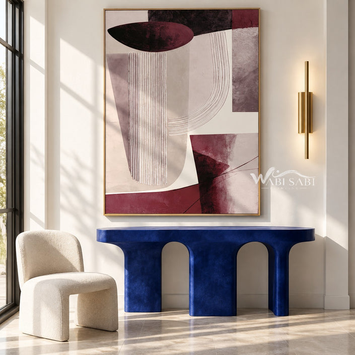 Burgundy and Cream U Curve Abstract Painting shown above a console.