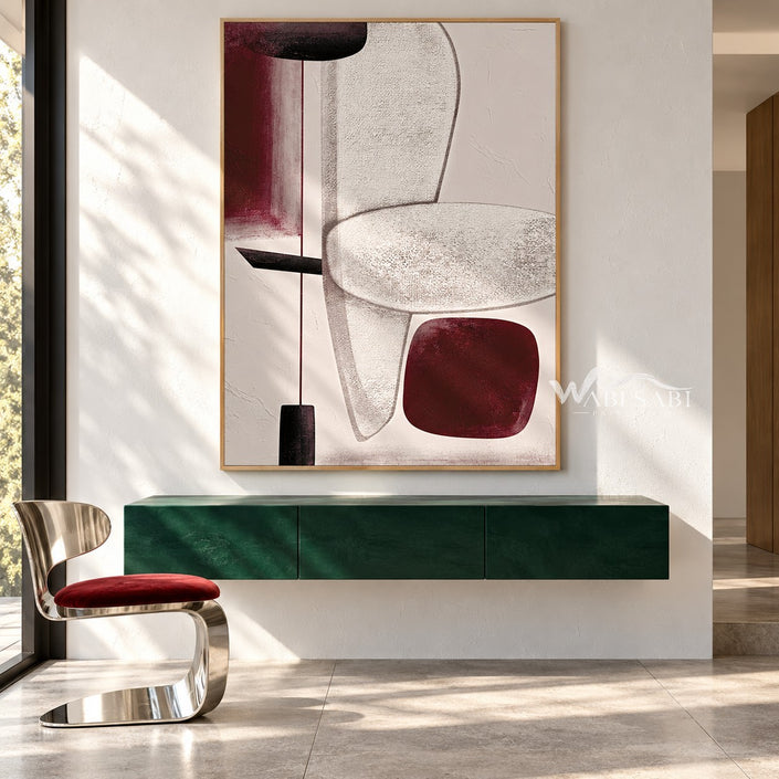 Burgundy Blocks and Oval Line Painting shown above a console.