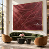 Burgundy Curved Line Abstract Painting shown in a living room with a sofa.