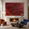 Burgundy Curved Line Abstract Painting shown near a fireplace.