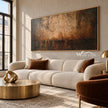 Burnished Dusk Wide Abstract Art shown above a sofa.