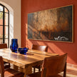 Burnished Dusk Wide Abstract Art shown in a dining area.