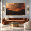 Burnt Orange Evening Landscape Wall Art shown above a brown sofa.