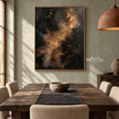 Charcoal Abstract Wall Art with Copper Clouds shown behind a dining table.
