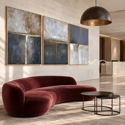 Charcoal and Ivory Block Triptych Wall Art shown in a living room with a sofa.