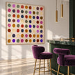 Colorful Dry Brush Dot Grid Painting shown in a bar area.